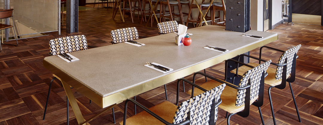 Light grey concrete table top, commercial project